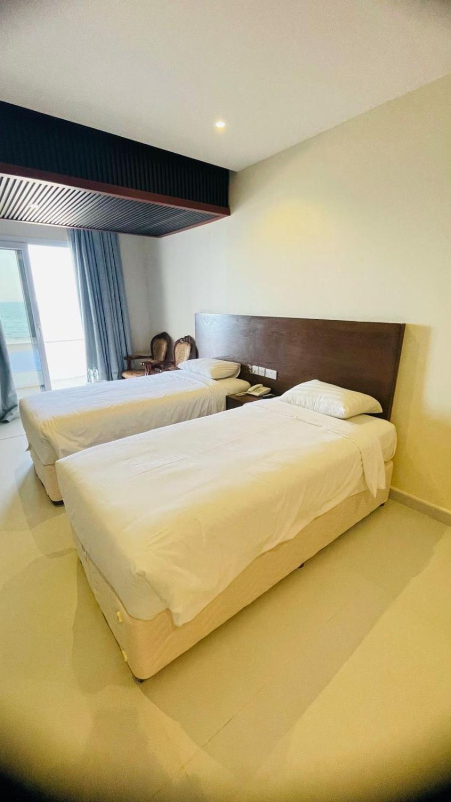 Resort Sur Beach Holiday Bagian luar foto