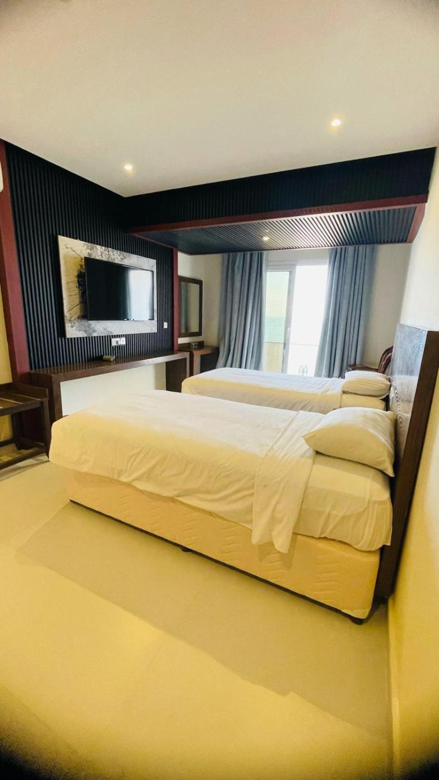 Resort Sur Beach Holiday Bagian luar foto